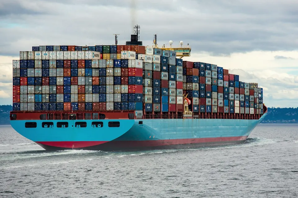Loaded container ship sailing at sea